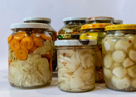 glass jars with canned vegetables, autumn harvest time,の写真素材