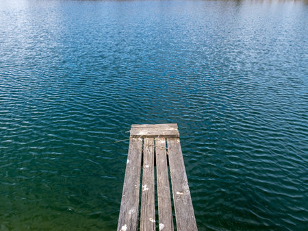 landscape with wooden footbridge, sunny spring dayの写真素材