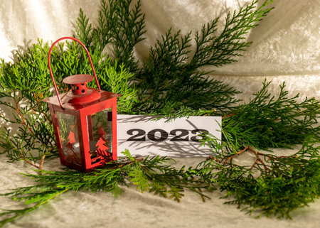 Christmas decorations, green needles, colorful ornaments, text 2023, Merry Christmas and Happy New...