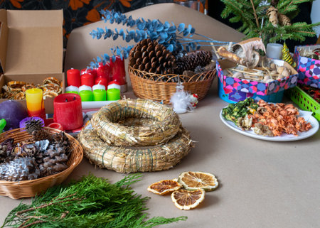 florist's workbench with various decoration elements, decorating an advent wreath, waiting for Christmas, handmadeの写真素材