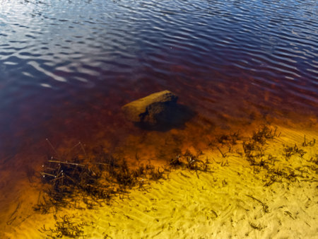 colorful abstract picture where spring water connects with lake water, wallpaper, beautiful water textureの写真素材