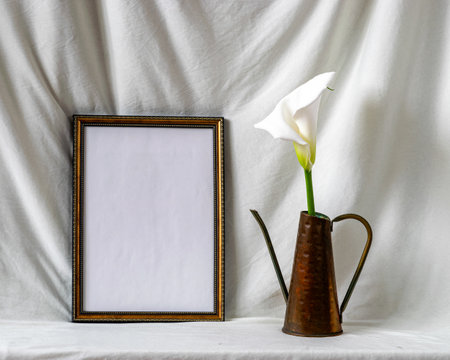 blank board on white fabric drapery background, still life