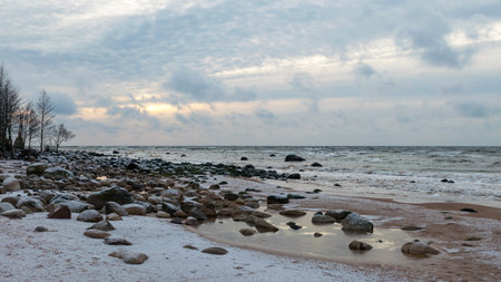 landscape with sea shore, rocks in water and sand, winter, December, Vidzeme rocky seashore, Latviaの写真素材