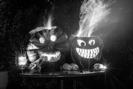 black and white decorated halloween pumpkins, holiday concept, halloween interior, home decorの写真素材