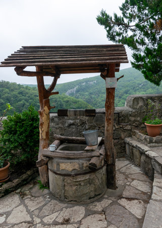 view of the old well, ancient water-taking place, summerの写真素材