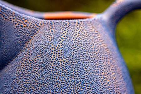 abstract blue clay glaze texture, close-up of clay pot, macro photographyの写真素材