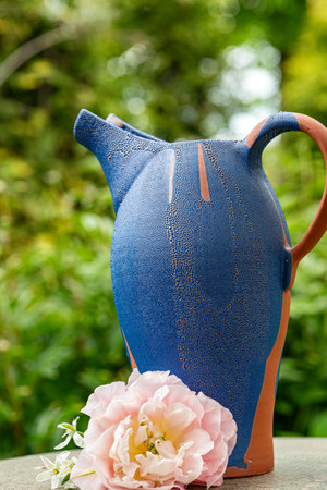 still life with a clay mug, decorative clay dishes, handmade, craftsman concept, interior items, home and garden decorの写真素材