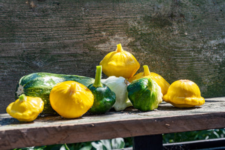 still life with various vegetables on a wooden board, healthy vegetarian diet, summerの写真素材