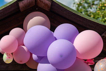 colorful balloons swaying in the wind, children's party, holiday decorations, party