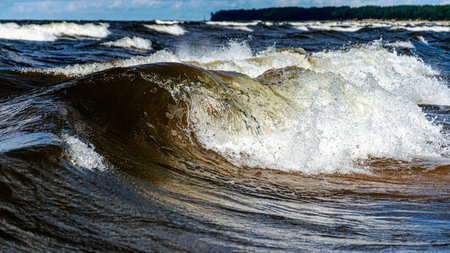 seascape, storm at sea, white waves crashing against the shore, Baltic Sea coast, Latvia, summer