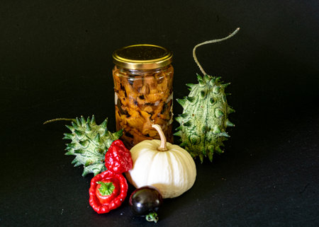 still life, autumn harvest in glass jars, autumn vegetables, traditional harvestの写真素材