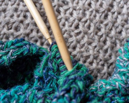 variegated knitting yarn and knitting needles, knitting fashion, wool yarn and needles, knitting hobby, needlework clothing, needlework concept, wool knitの写真素材