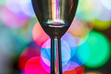 glass silhouette on a blurred and unclear, abstract, colorful, different shapes and brightness light background, holiday conceptの写真素材