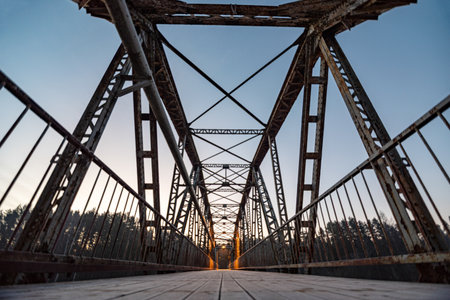 iron structure bridge over the river Gauja, popular walking spot, dawn light, Valmiera, Latvia
