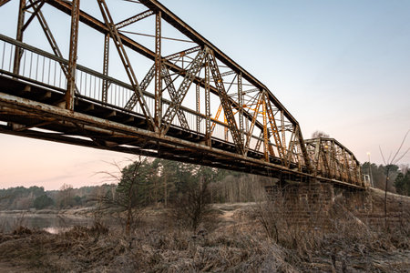 iron structure bridge over the river Gauja, popular walking spot, dawn light, Valmiera, Latvia