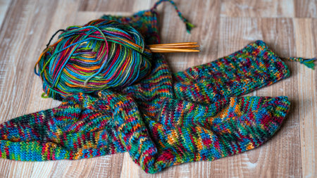 colorful knitting yarn and knitting needles, knitwear fashion, wool socks and needles, knitting...