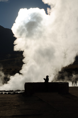 Shocked woman gazes at the sun thrugh a steam veil in Atacama desert, Chileの写真素材