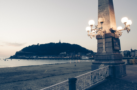 One of the most iconic streets lamps in La Concha beach, San Sebasti n.の写真素材