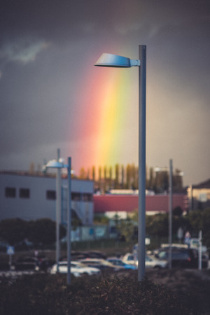 Rainbow colors apparently coming from a stretlight in Mutilva, Navarra, Spainの写真素材