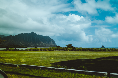 The southeast island is volcanically active, whereas the islands on the northwest end of the archipelago are older and typically smaller, due to longer exposure to erosion.の写真素材