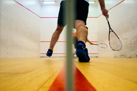 Two friends playing squash in Mutilva, Navarra, Spainの写真素材