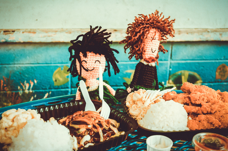 Bride and groom wool puppets having lunch in Hawaii, USの写真素材
