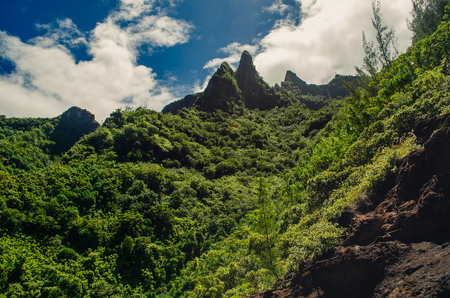 Abrups peaks are common in volcanic landscapes like this one in Kalalau Trail, Kauai, USの写真素材