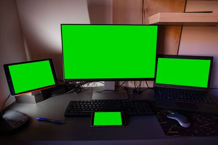 Four green screens on the desktop