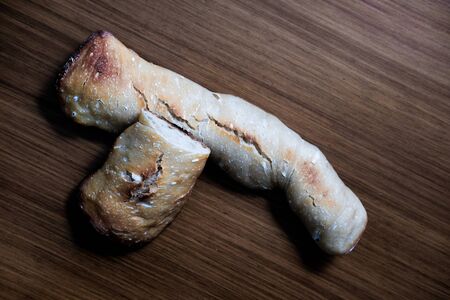 Two pieces of home made bread over the kitcleh ntableの写真素材