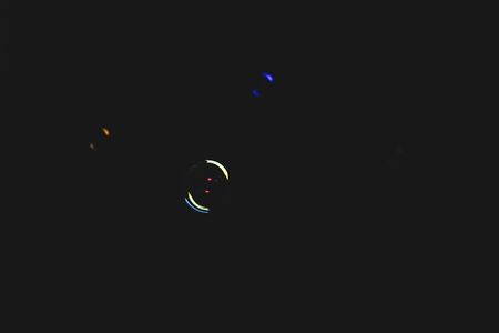Colorful bubbles over dark background