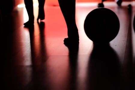 Mother and children barefoot playing at homeの写真素材