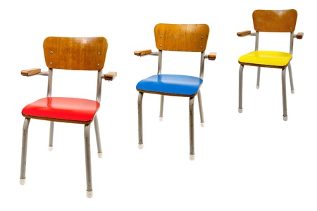 three colorful school chairsの写真素材