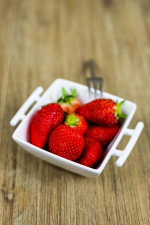 bowl of fresh strawberries. shallow depth of fieldの写真素材