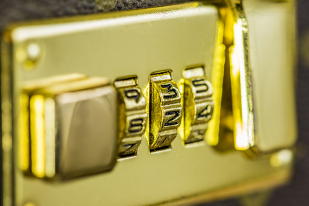 macro shot of a combination lock of a suitcase  shallow depth of fieldの写真素材