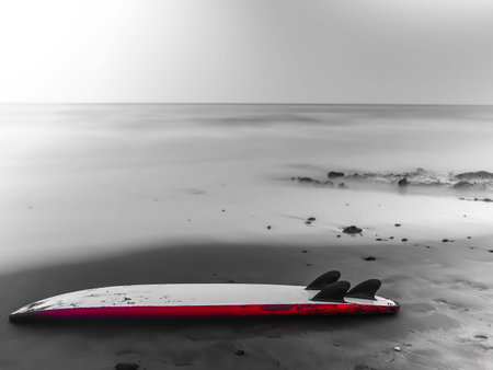 surfboard on the beach in the winter