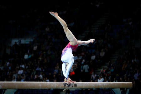Szczecin, Poland, April 14, 2019: Ilaria Kaeslin of Switzerland competes on the balance beam during the artistic gymnastics championshipsのeditorial素材