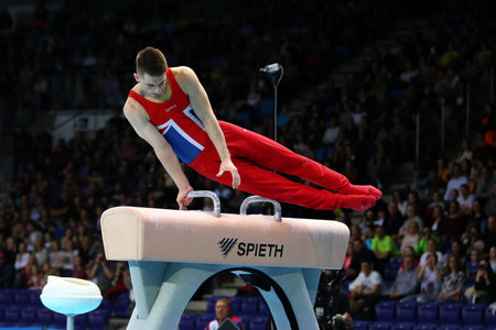 Szczecin, Poland, April 13, 2019: Max Whitlock of Great Britain competes on the pommel horse during...