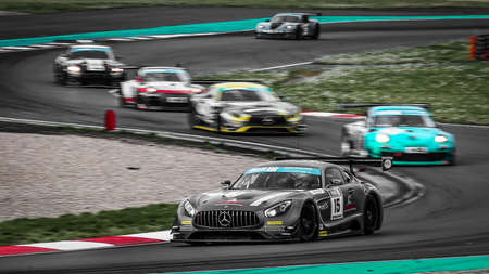 Oschersleben, Germany, April 28, 2019: racing driver Mario Hirsch driving a Mercedes AMG SLS during the Spezial Tourenwagen Trophy at the Motorsport Arena in Oschersleben, Germany.のeditorial素材
