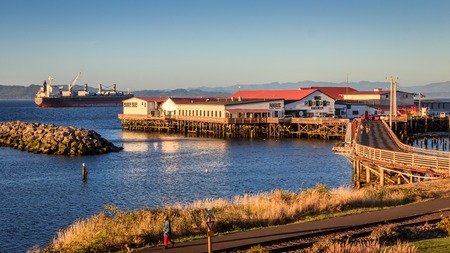 Astoria, Oregon, United States of American - 09-15-2016 : The sun sets on Pier 39 in Astoria, Oregonのeditorial素材