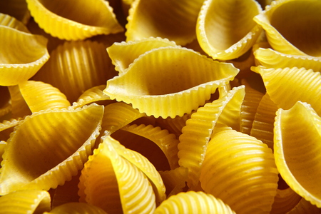 Raw uncooked dry Conchiglioni italian pasta. shells shapedの写真素材