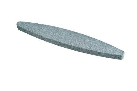 Sharpening stone. Grindstone or whetstone sharpener, isolated on white background. Kitchen utensilsの写真素材