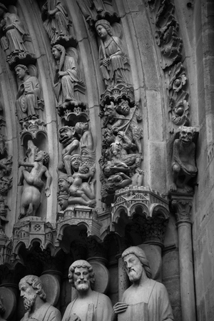 Sculptures of the western facade of Notre Dame de Paris. Main entrance - Portal of the Last Judgmentの写真素材