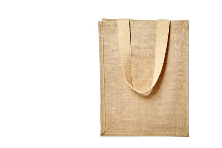reusable shopping bag, natural textile fiber, eco hessian or jute sack isolated on white backgroundの写真素材