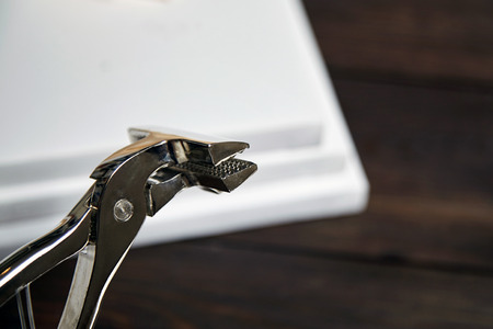 Canvas pliers and white canvases wrapped on stretcher barsの写真素材