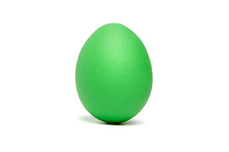 Green Easter egg isolated on white background. Traditional symbol of Christian holidayの写真素材