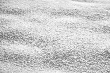 Natural snowy texture, winter background. Frosty weather with loose snow surface in wintertimeの写真素材