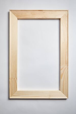 Single wooden stretcher bars for canvas on grey backgroundの写真素材