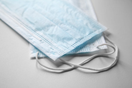 Disposable face masks. Medical surgical masks. COVID-2019, coronavirus pandemic. Airborne disease...