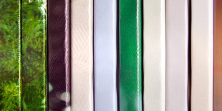 Canvas prints, stack of colorful photos with gallery wrapping method of canvas stretching on...