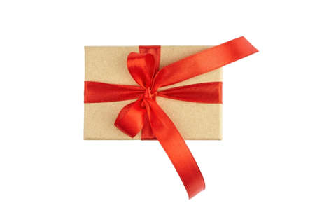 Gift box or present box with red ribbon bow isolated on white background, top view. Holidays concept.の写真素材